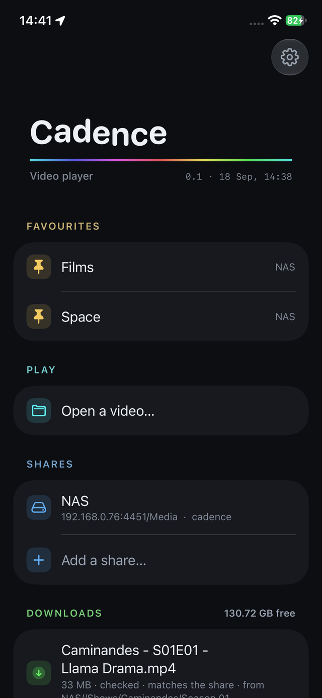 Cadence on an iPhone: the front page, with pinned folders, a download on its way and recent films