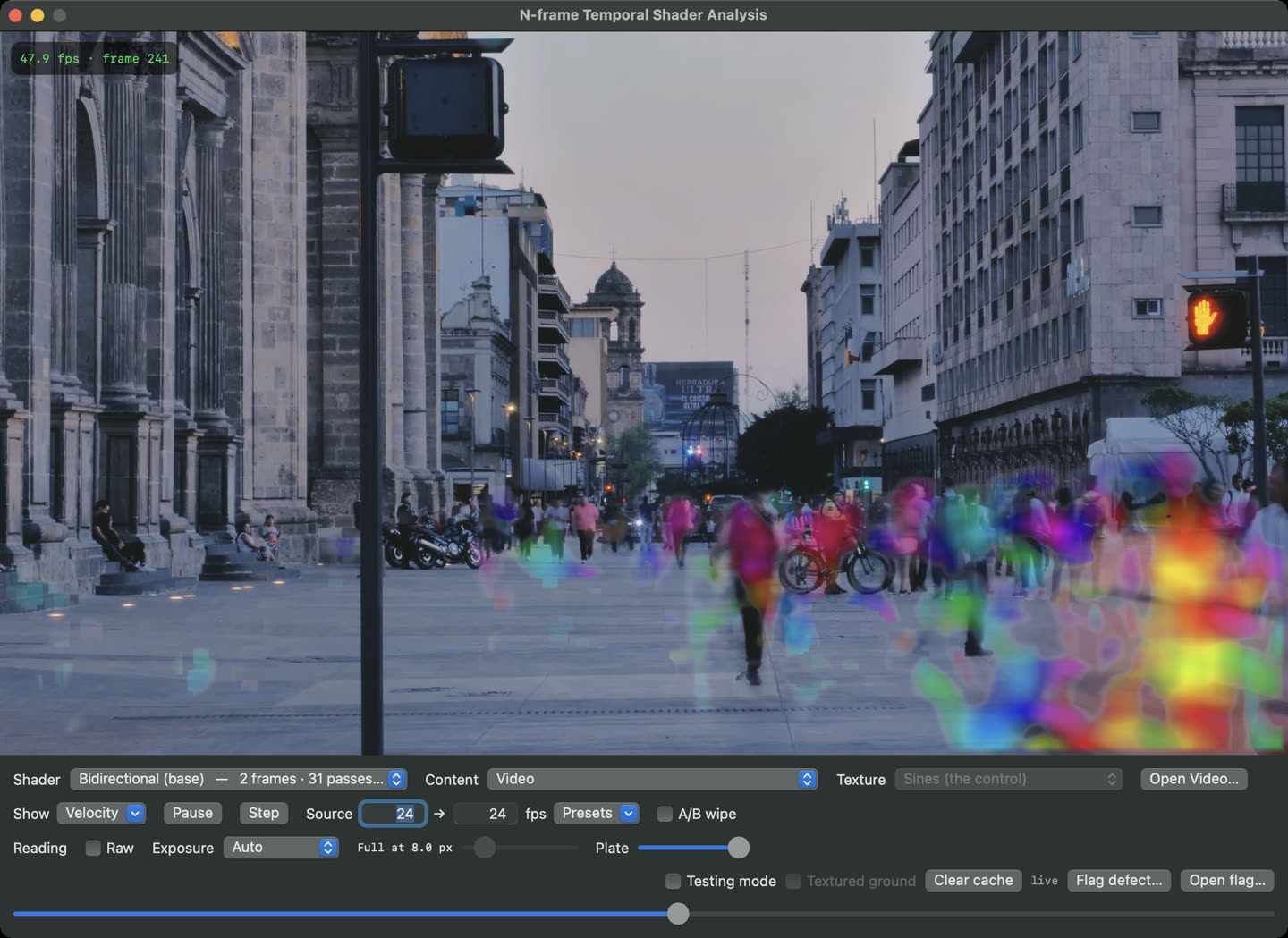 The app showing a 4K street scene with the velocity field painted on the people walking